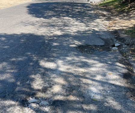 Con carreteras destrozadas reciben a los vacacionistas en Tlapacoyan